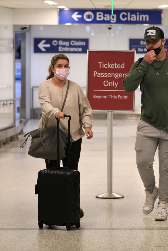 HALEY and Pete ALONSO at LAX Airport in Los Angeles 01/09/2022
