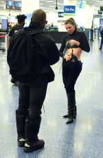 JULIA FOX and Kaney West at Miami International Airport 01/22/2022