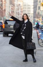 KARLIE KLOSS Hailing a Taxi Out in New York 01/27/2022