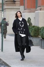 KARLIE KLOSS Hailing a Taxi Out in New York 01/27/2022