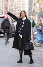 KARLIE KLOSS Hailing a Taxi Out in New York 01/27/2022