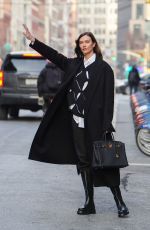 KARLIE KLOSS Hailing a Taxi Out in New York 01/27/2022