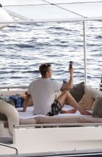 KELLY GALE and Joel Kinnaman at a Beach in St. Barths 01/05/2022