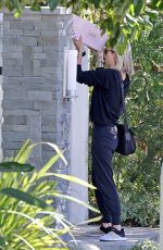 KELLY RIZZO Collects Mail Outside Her Home in Los Angeles 01/20/2022