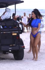KIM KARDASHIAN in Bikini at a Photoshoot for Her SKIMS Swimwear Line 01/18/2022