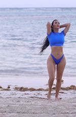 KIM KARDASHIAN in Bikini at a Photoshoot for Her SKIMS Swimwear Line 01/18/2022