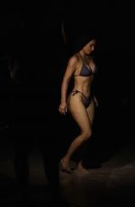 KIM KARDASHIAN in Swmisuit at Evening Photoshoot for Her Skims Swimwear Line 01/18/2022