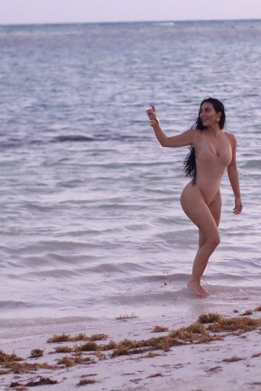 KIM KARDASHIAN in Swmisuit at Evening Photoshoot for Her Skims Swimwear Line 01/18/2022