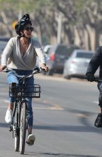 LAUREN SILVERMAN and Simon Cowell Riding Bikes Out in Malibu 01/06/2022