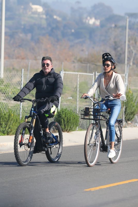 LAUREN SILVERMAN and Simon Cowell Riding Bikes Out in Malibu 01/06/2022