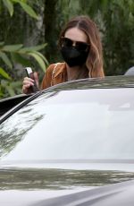 LILY JAMES Leaves San Vincente Bungalows in West Hollywood 01/17/2022