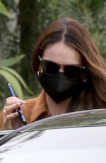 LILY JAMES Leaves San Vincente Bungalows in West Hollywood 01/17/2022