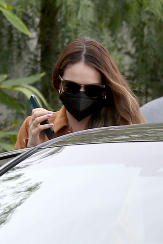 LILY JAMES Leaves San Vincente Bungalows in West Hollywood 01/17/2022