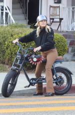 MALIN AKERMAN Out Riding a Bike in Los Angeles 01/14/2022