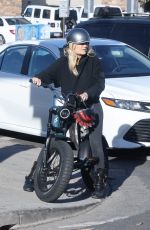 MALIN AKERMAN Rides Her Electric Motorcycle Out in Los Angeles 01/21/2022