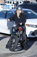 MALIN AKERMAN Rides Her Electric Motorcycle Out in Los Angeles 01/21/2022