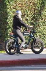 MALIN AKERMAN Rides Her Electric Motorcycle Out in Los Angeles 01/21/2022