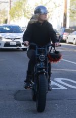 MALIN AKERMAN Rides Her Electric Motorcycle Out in Los Angeles 01/21/2022