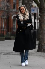 OLIVIA ATTWOOD on the Set of Her New Documentary Getting Filthy Rich in London 01/25/2022