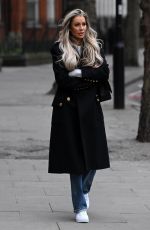 OLIVIA ATTWOOD on the Set of Her New Documentary Getting Filthy Rich in London 01/25/2022