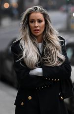 OLIVIA ATTWOOD on the Set of Her New Documentary Getting Filthy Rich in London 01/25/2022