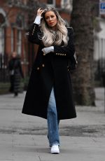OLIVIA ATTWOOD on the Set of Her New Documentary Getting Filthy Rich in London 01/25/2022