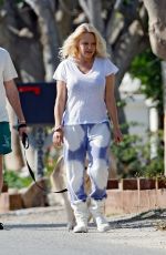 PAMELA ANDERSON and Dan Hayhurst Out in Malibu 01/14/2022