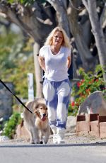 PAMELA ANDERSON and Dan Hayhurst Out in Malibu 01/14/2022