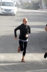 RENEE ZELLWEGER and Ant Anstead Out Jogging in Laguna Beach 01/06/2022