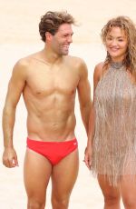 RITA ORA at a Photoshoot on the Beach in Sydney 01/17/2022