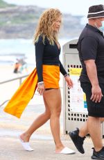 RITA ORA at a Photoshoot on the Beach in Sydney 01/17/2022