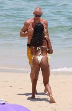 TINA KUNAKEY in Bikini and Vincent Cassel at a Beach in Rio de Janeiro 01/07/2022