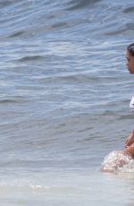 TINA KUNAKEY in Bikini at a Beach Rio de Janeiro 12/27/2021