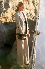 AMBER VALLETTA at a Photoshoot on the Beach in Malibu 02/09/2022