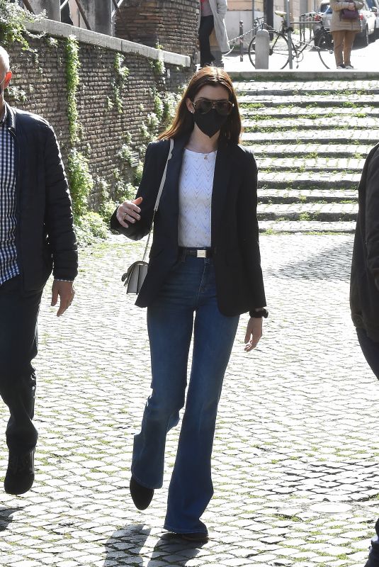 ANNE HATHAWAY Arrives at San Clemente Basilica in Rome 02/20/2022