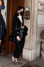 ANNE HATHAWAY Leaves Her Hotel in Rome 02/20/2022