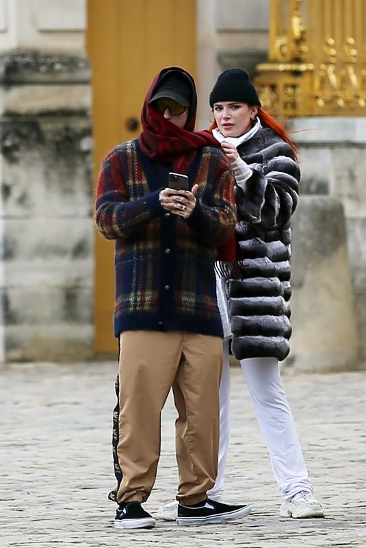 BELLA THORNE and Benjamin Mascolo Arrives to Versailles 02/16/2022