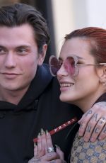 BELLA THORNE and Benjamin Mascolo Out Shopping in Rome 02/09/2022