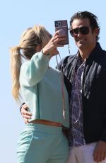 BRAUNWYN WINDHAM-BURKE and Sean Burke Out on the Beach in Newport Beach 01/30/2022