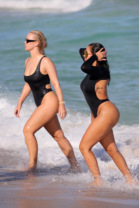 CHANEY JONES and BIANCA ELOUISE in Swimsuit at a Beach in Miami 02/23/2022