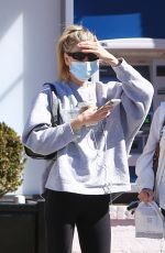 CHARLOTTE MCKINNEY Leaves a Gym in Brentwood 02/24/2022