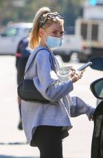 CHARLOTTE MCKINNEY Leaves a Gym in Brentwood 02/24/2022
