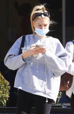 CHARLOTTE MCKINNEY Leaves a Gym in Brentwood 02/24/2022