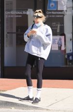 CHARLOTTE MCKINNEY Leaves a Gym in Brentwood 02/24/2022