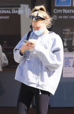 CHARLOTTE MCKINNEY Leaves a Gym in Brentwood 02/24/2022