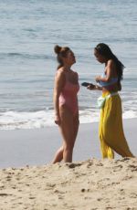 CHRISSY TEIGEN in Bikini at a Beach in Malibu 02/21/2022
