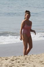 CHRISSY TEIGEN in Bikini at a Beach in Malibu 02/21/2022