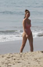 CHRISSY TEIGEN in Bikini at a Beach in Malibu 02/21/2022