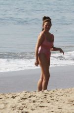 CHRISSY TEIGEN in Bikini at a Beach in Malibu 02/21/2022