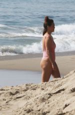 CHRISSY TEIGEN in Bikini at a Beach in Malibu 02/21/2022